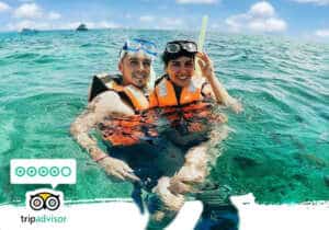 young couple enjoying the best snorkel in cancun and puerto morelos