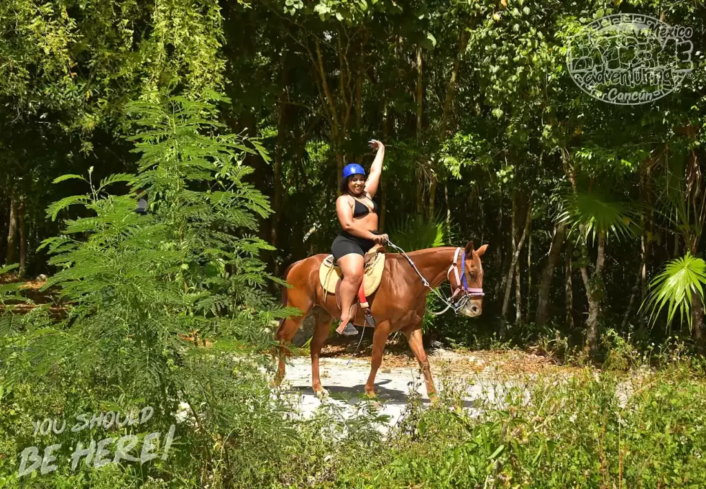 curvy-woman-ride-horse-in-cancun-solo-female-travel-in-riviera-maya
