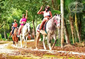 group-of-young-womens-riding-a-horse-in-cancun-expedition-tours