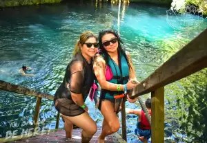 woman-enjoying-the-fresh-cenote-waters-tour-in-cancun-adventures-and-expeditions